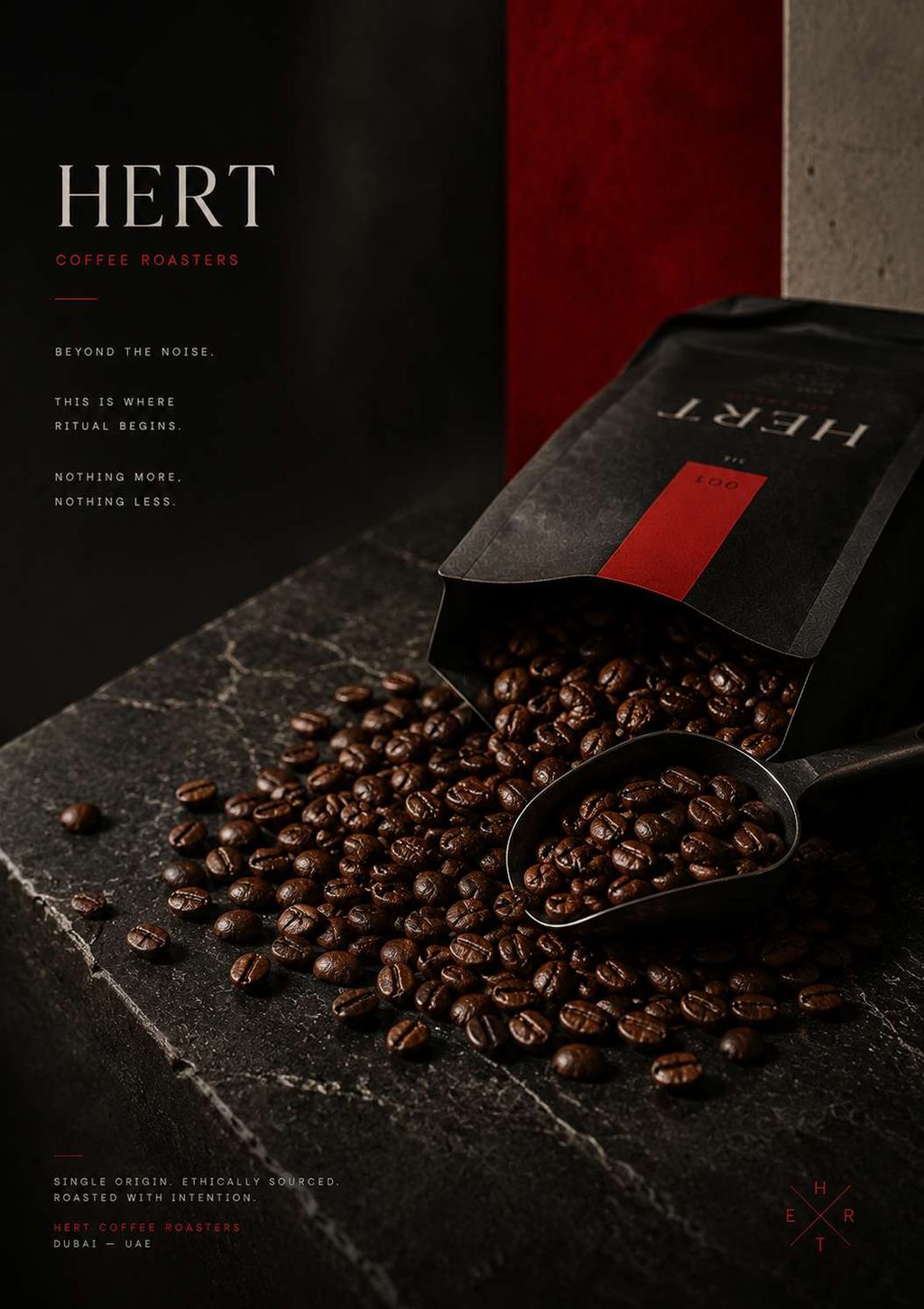 Roasted beans spilling from an open bag across dark stone.